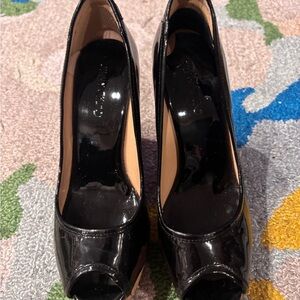 Jimmy Choo patent leather peep toe cork wedge size 6.5 great condition.